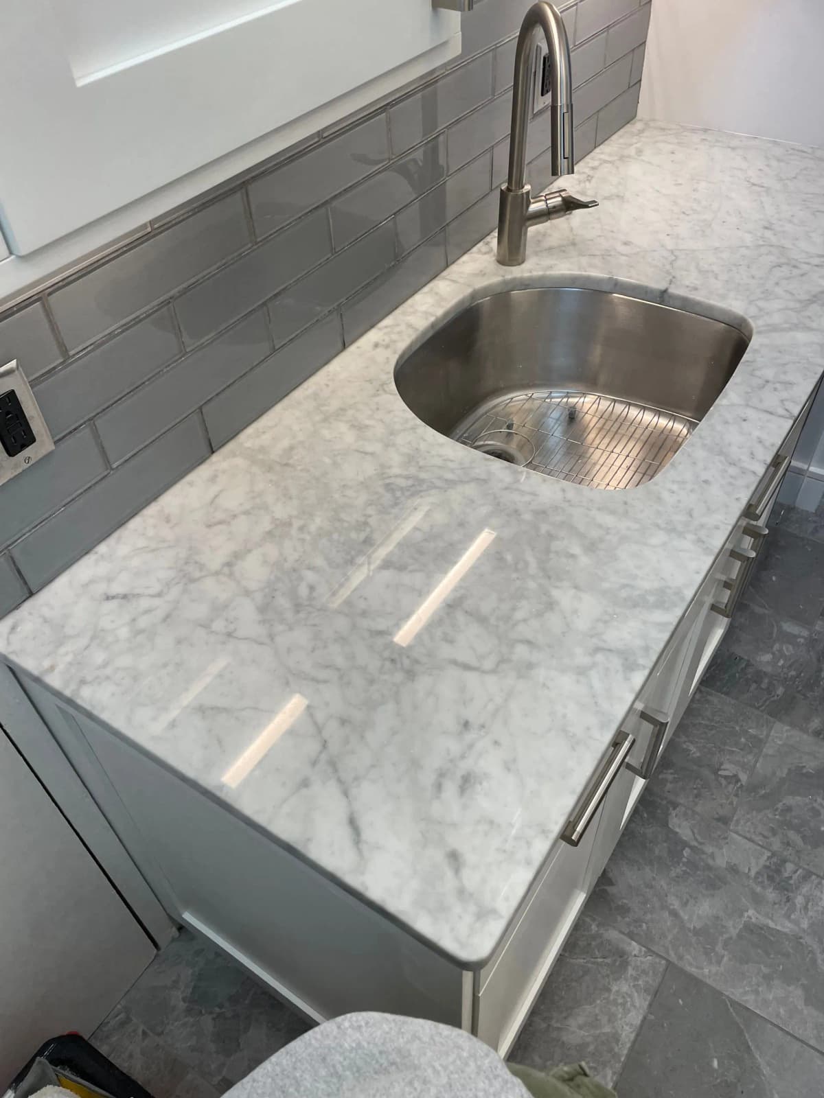 Beautiful natural stone countertop being professionally maintained